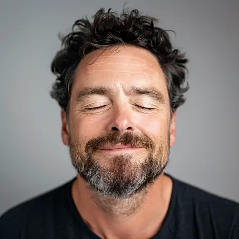 relief - closed eyes and a relaxed mouth